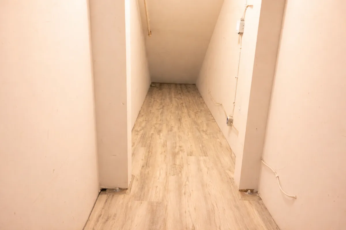 Warehouse hallway with new vinyl plank flooring installed